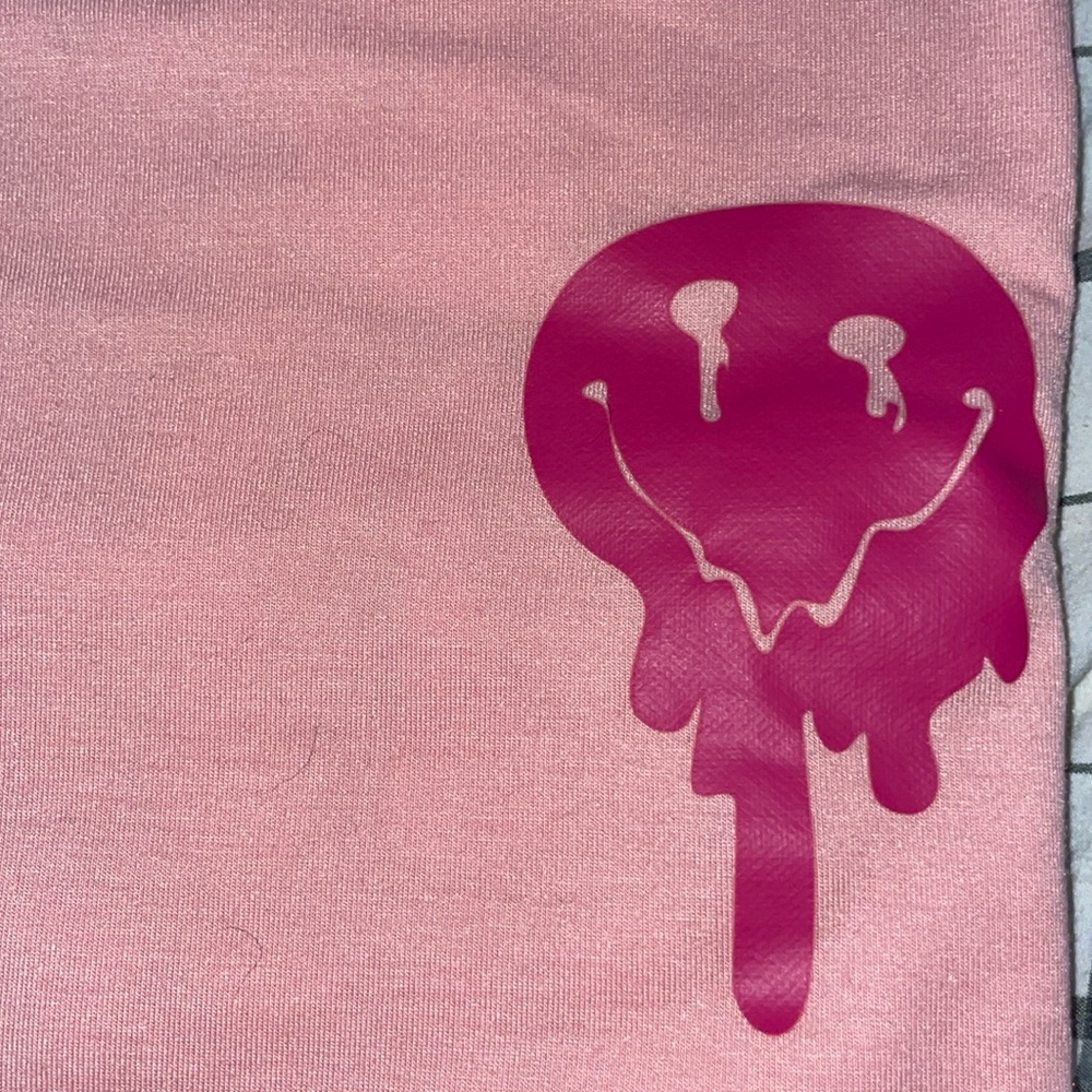 Amazon T-shirt, melting smiley face